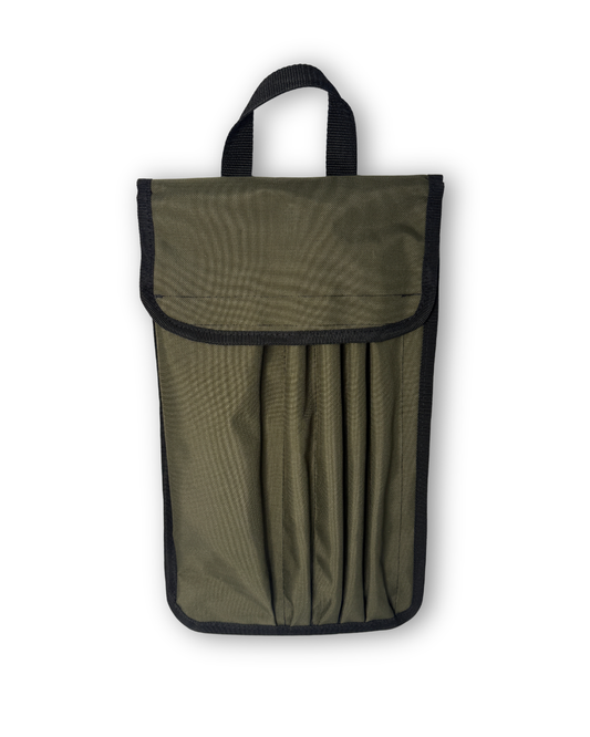 Green pouch with black trim and handle on a white background.